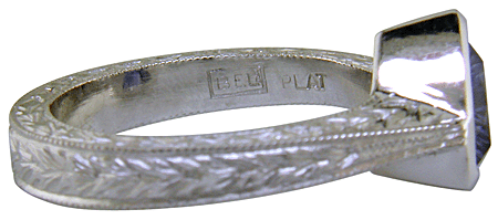 Close up of Bijoux Extraordinaire hallmark (BEL). (J8707)