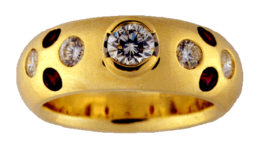 Diamond and garnet dome-style ring in 14kt yellow gold.