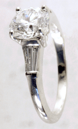 Side view of platinum diamond engagement ring.