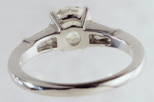 Inside view of custom platinum ring with tapered diamond baguettes.