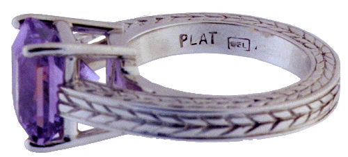 Engraved platinum ring with lavender spinel.
