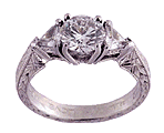 Engraved platinum engagement rings with diamonds.