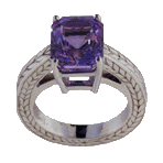 Engraved platinum ring with lavender spinel.