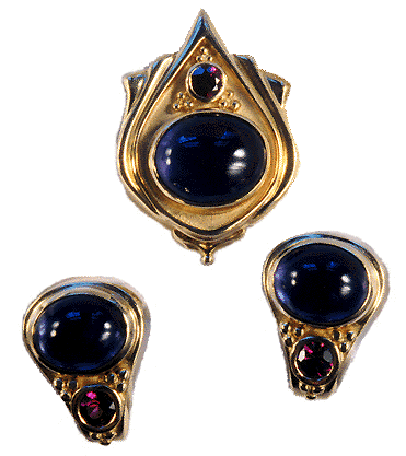 Yellow Gold Iolite and Garnet Slide Pendant and Earrings.