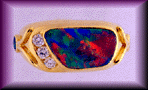 A striking opal and diamond ring. (J3518)