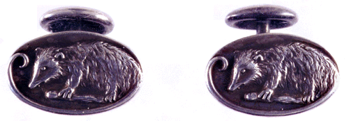 Close-up of Art Nouveau possum cufflinks from Unger Brothers. (J3606)