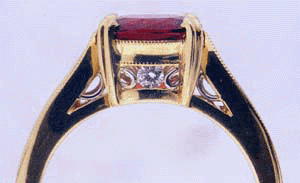 Side view of red spinel ring with two diamonds.