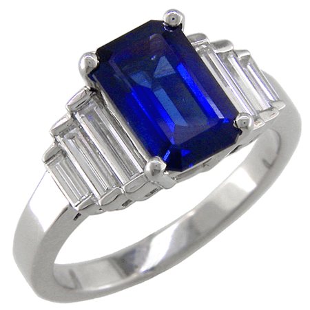 Platinum ring with an emerald-cut sapphire and baguette diamond side stones. (J3868)
