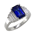 Emerald-cut sapphire rings with baguette diamonds crafted in platinum.