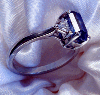 3/4 view of the platinum and sapphire ring.