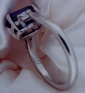 View of  "BEL" hallmark and purity stamp on platinum and sapphire ring.
