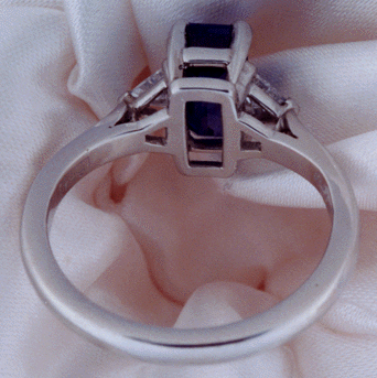 View of the underside of the sapphire and platinum ring.