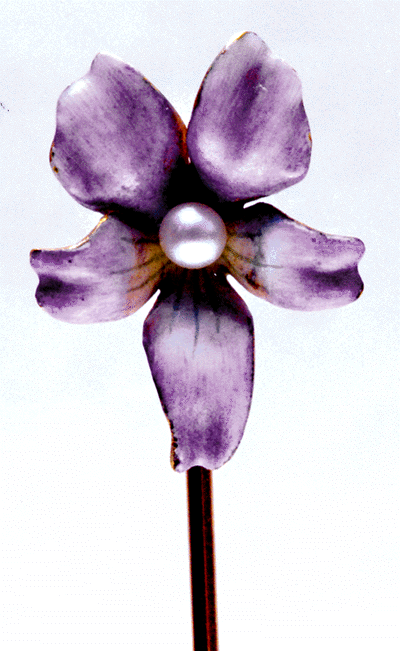 An Art Nouveau flower stickpin. (J3502)