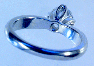 Inside view of platinum and diamond engagement ring.