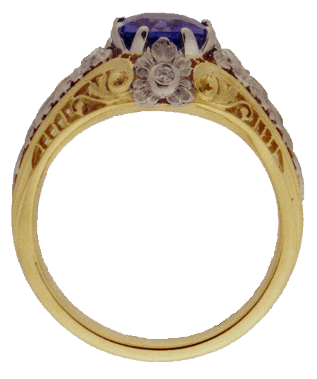 Top view of filigree ring with tanzanite and diamonds.